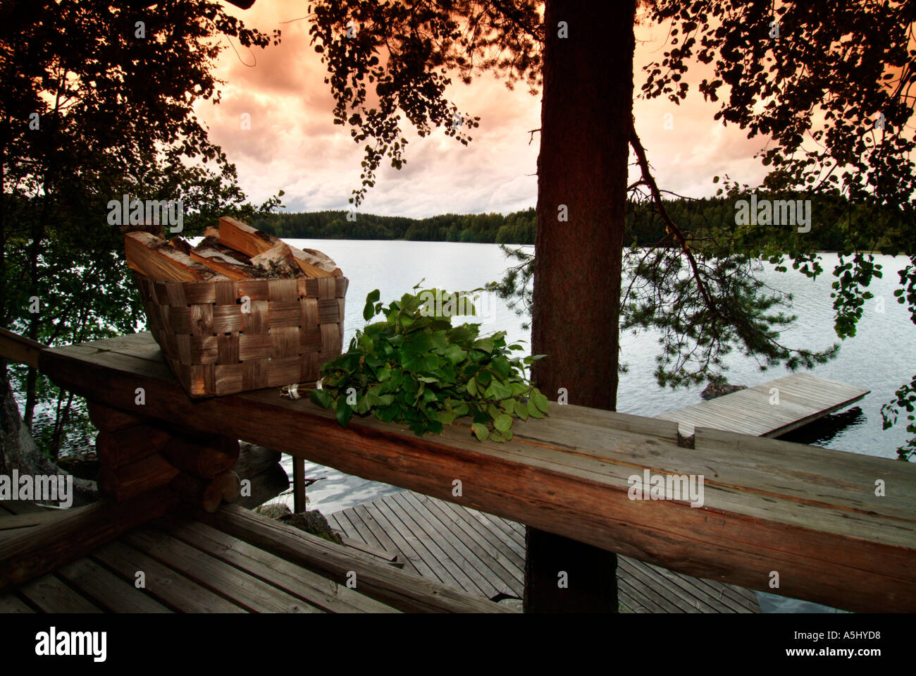 PR basket filled with firewood and branches of birches prepared for