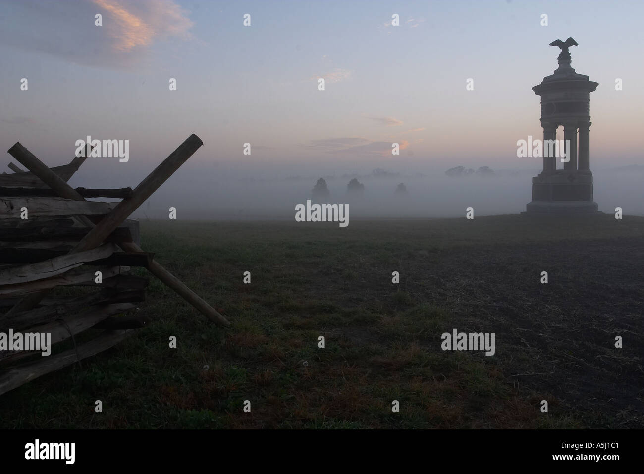Fencerow and mist Stock Photo
