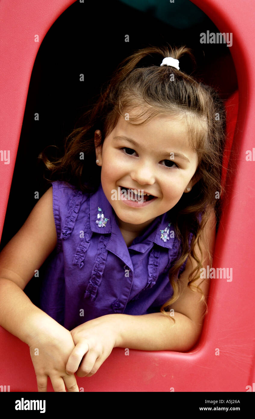 Little girl in playhouse Stock Photo Alamy
