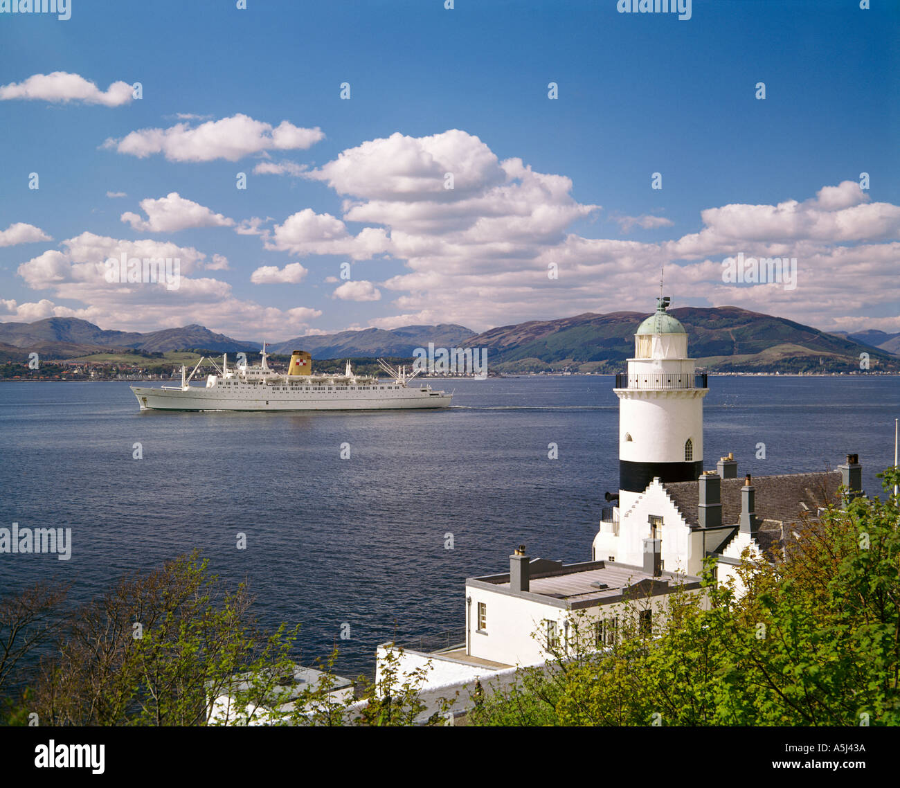 U K Scotland Firth of Clyde The Clock Lighthouse and the Empress of Canada 1956 Stock Photo