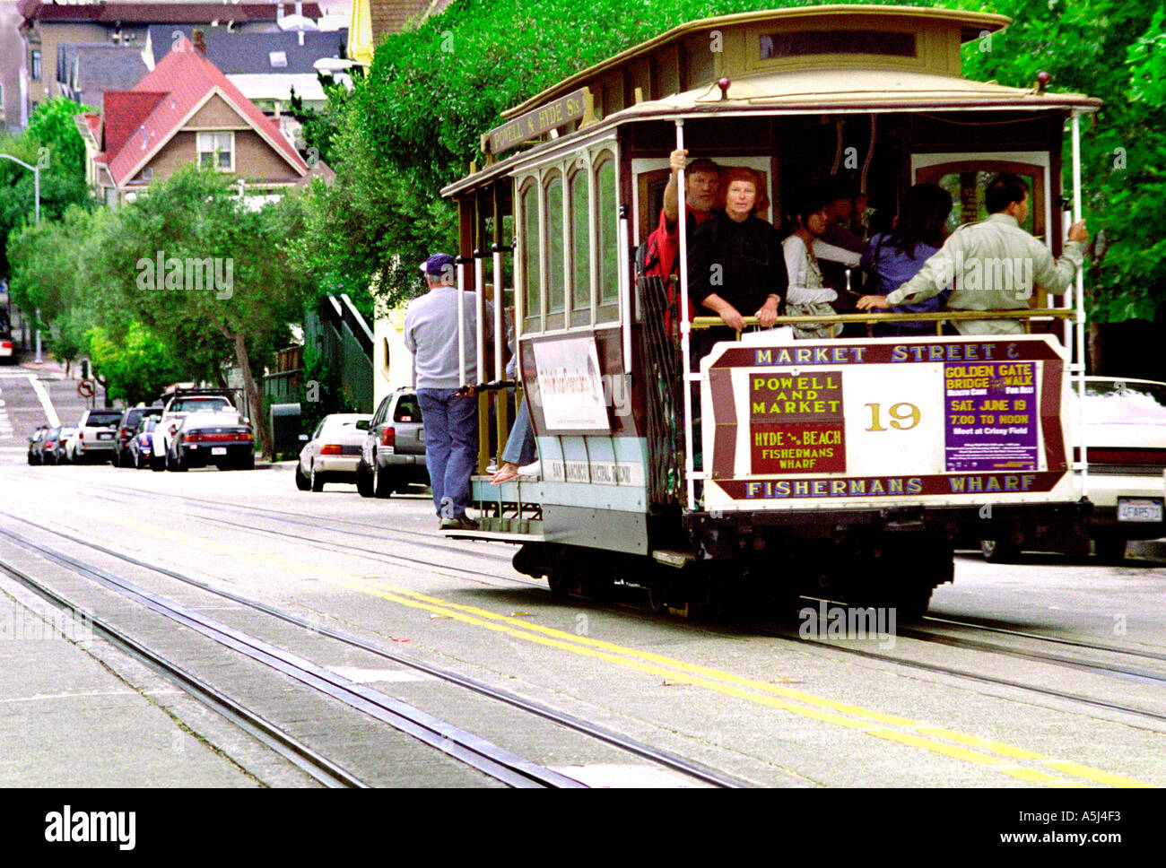 San Francisco cable car transporting tourists Stock Photo