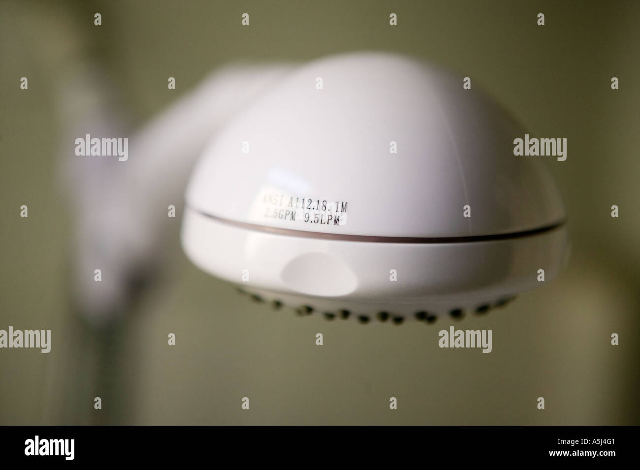 Close up view of a white plastic shower head February 2006 Stock Photo