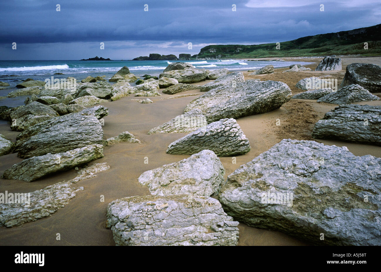 Ireland Bay Rocks Rocks on the beach at White Park Bay on the north coast of County ...