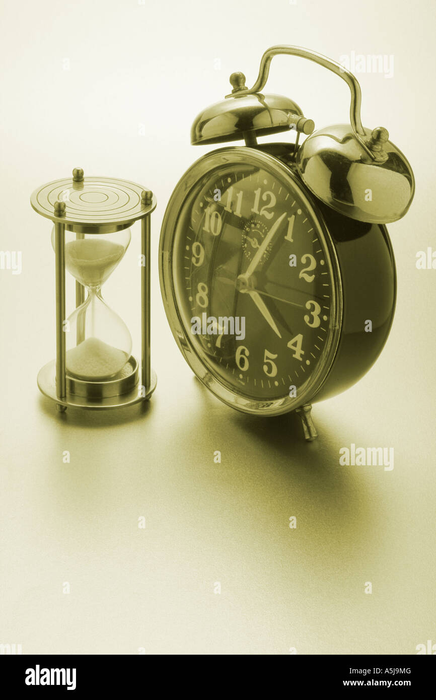 Alarm Clock and Hourglass Stock Photo Alamy