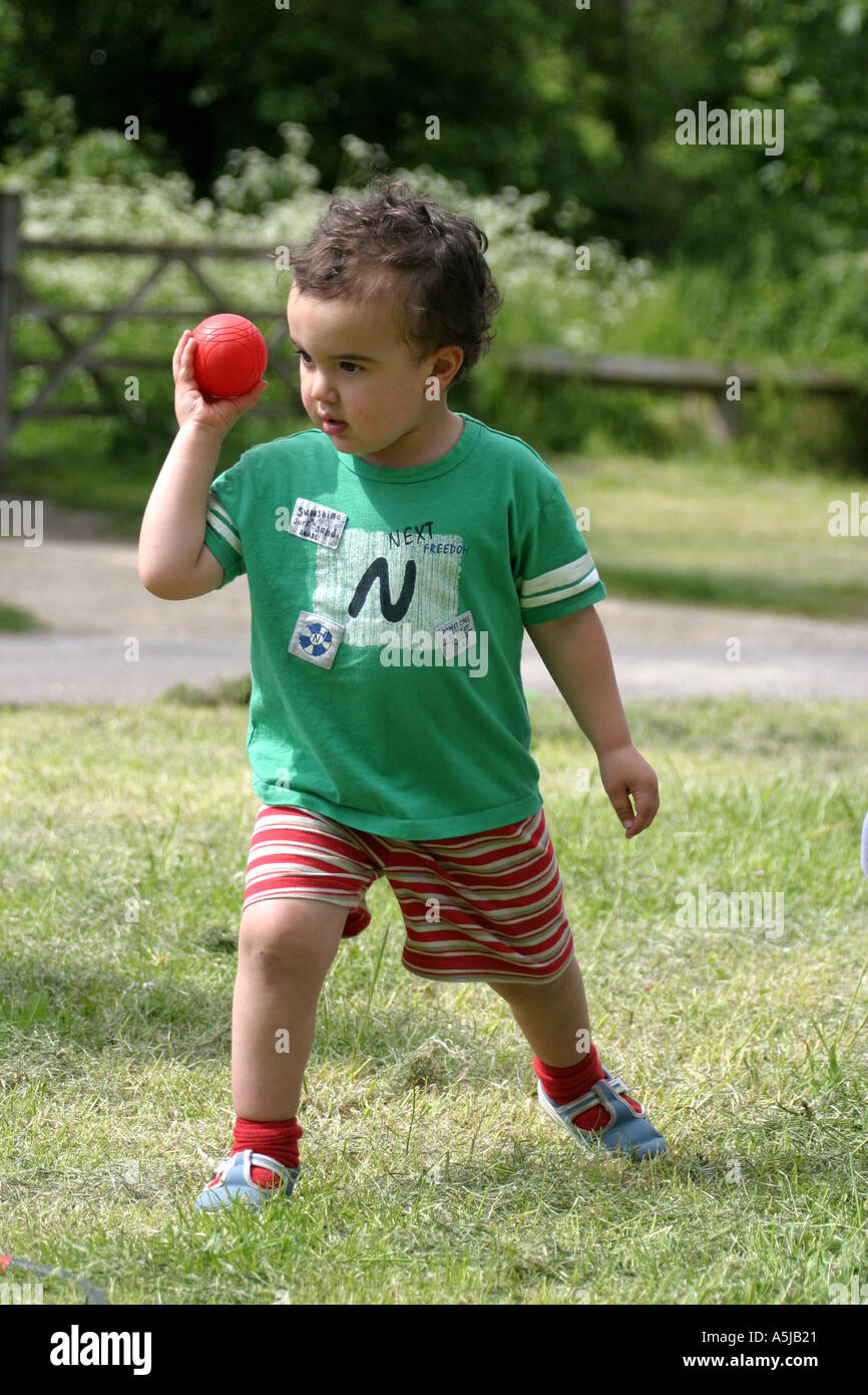kid throwing ball