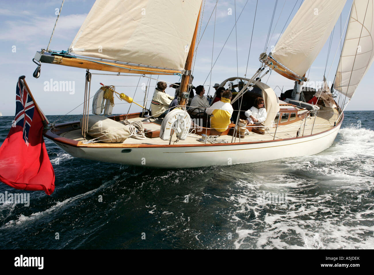 traditional wooden yacht sailing in falmouth harbour uk Stock Photo Alamy