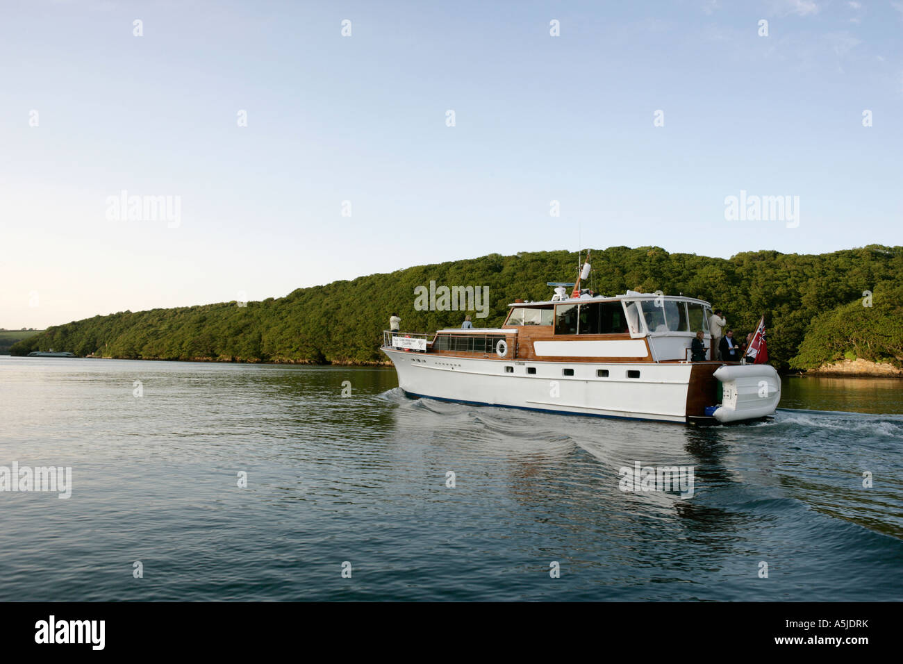 motor launch cruising in falmouth harbour uk Stock Photo Alamy