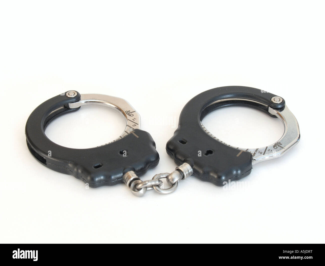 black policeissue handcuffs Stock Photo Alamy