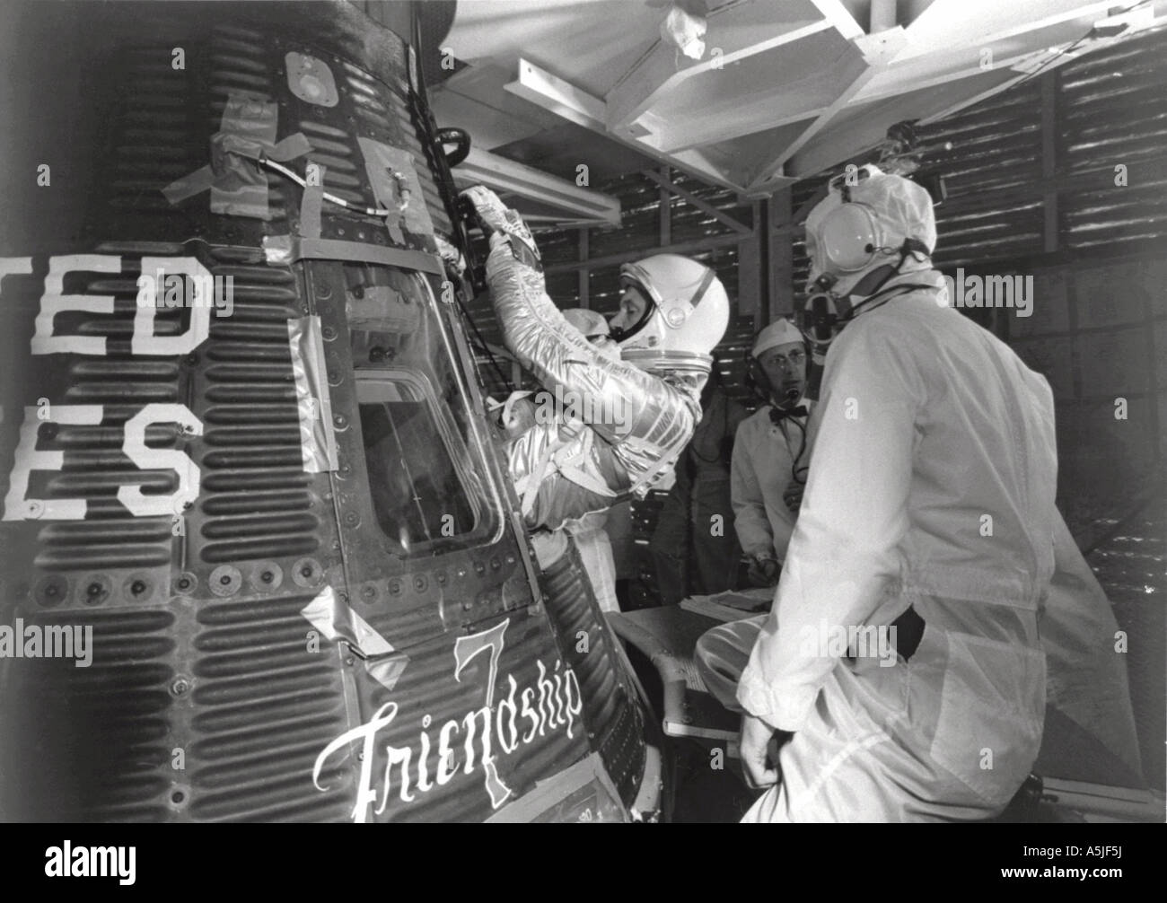 Astronaut John H. Glenn Jr. enters his Mercury capsule.  02/20/1962 Stock Photo