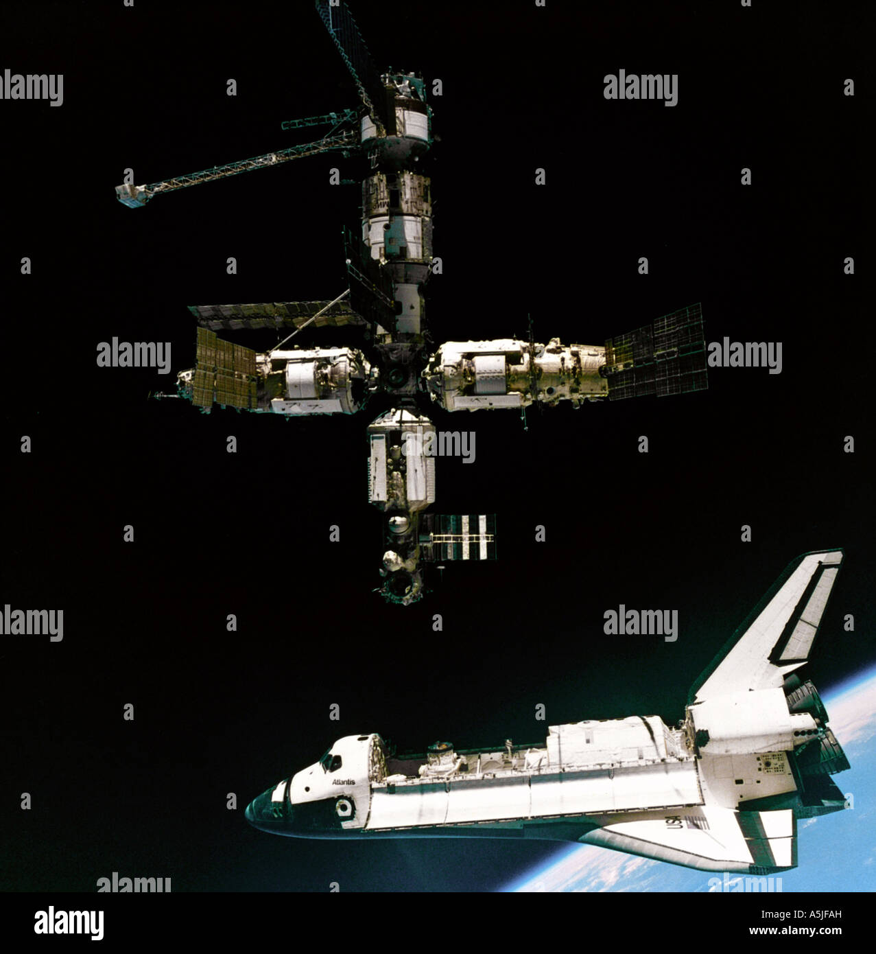 A view of the Space Shuttle Atlantis departing the Mir Russian Space Station. Date: 07/04/1995 Stock Photo