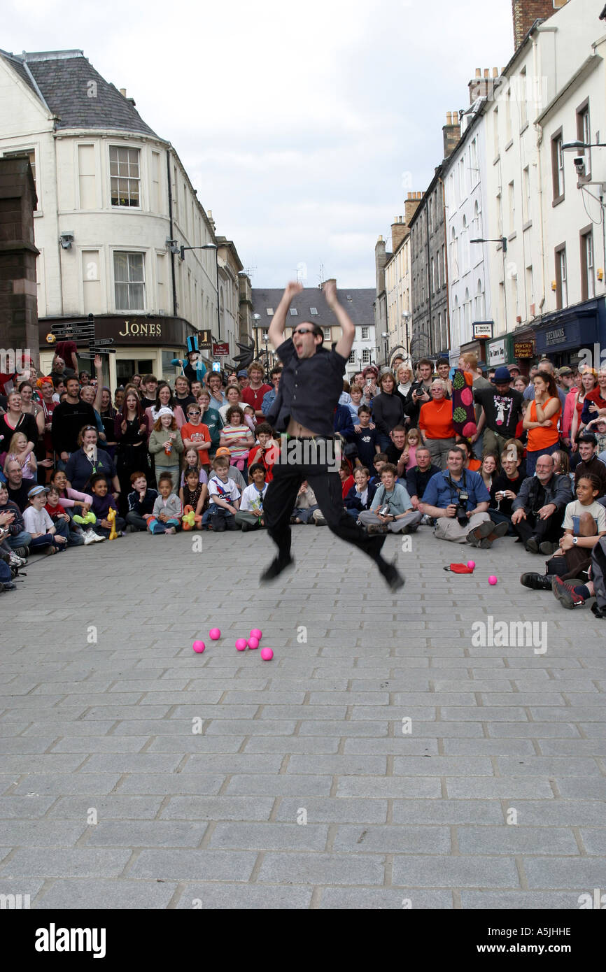 Juggling competition jumping for joy Stock Photo Alamy