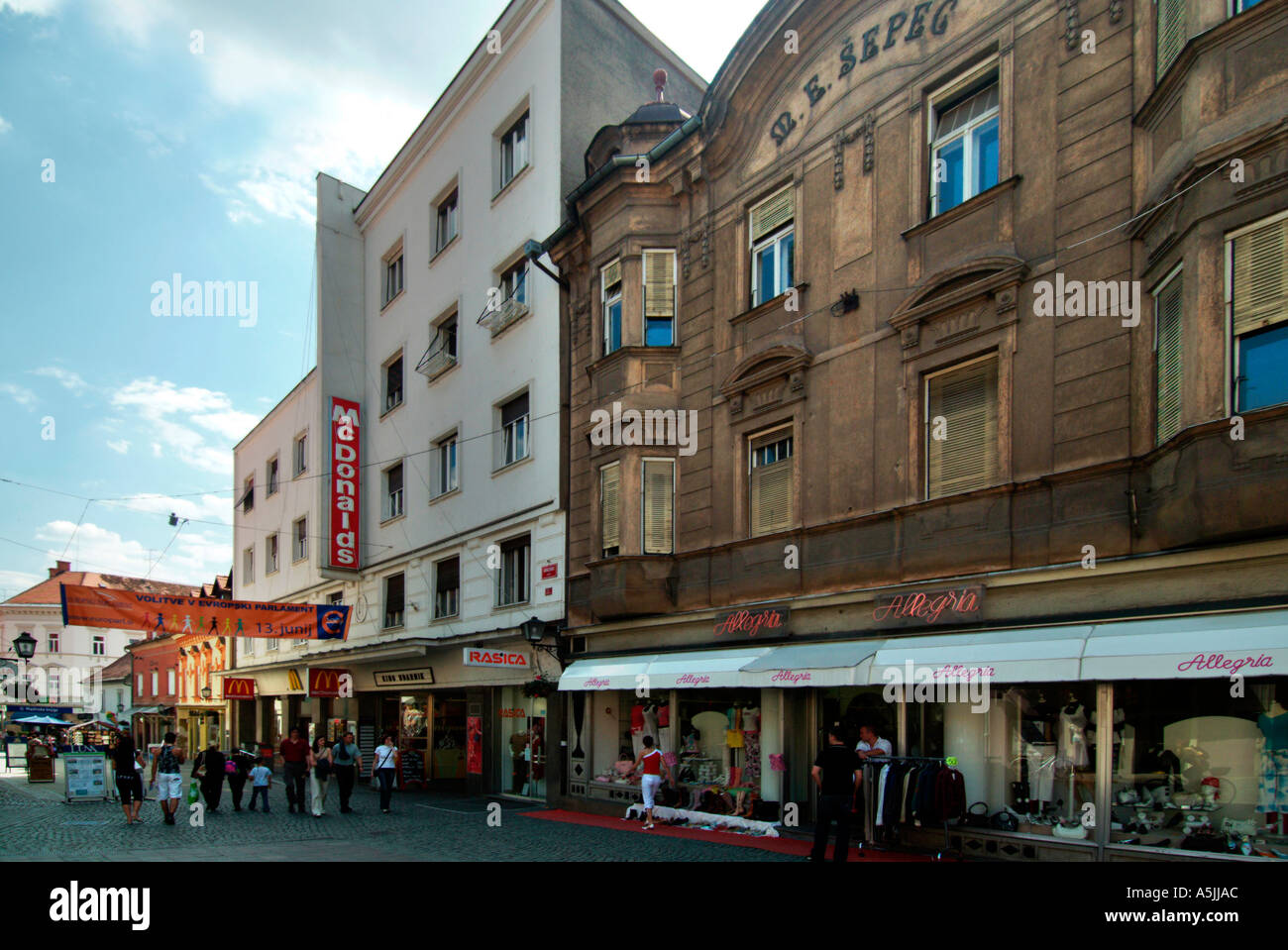 houses with McDonalds at the Place Grajski trg by the castle of Maribor ...