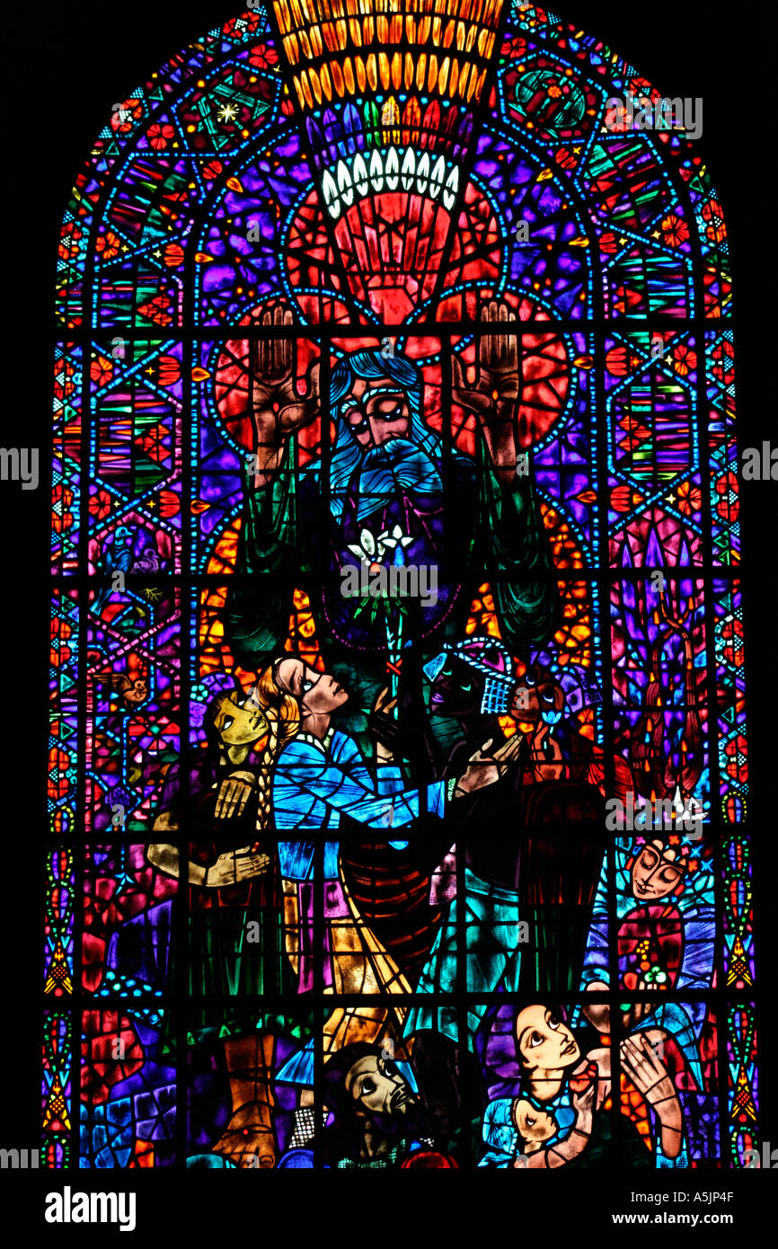 Stained Glass window by Ervin Bossanyi depicting peace among the nations of the world Canterbury Cathedral Stock Photo