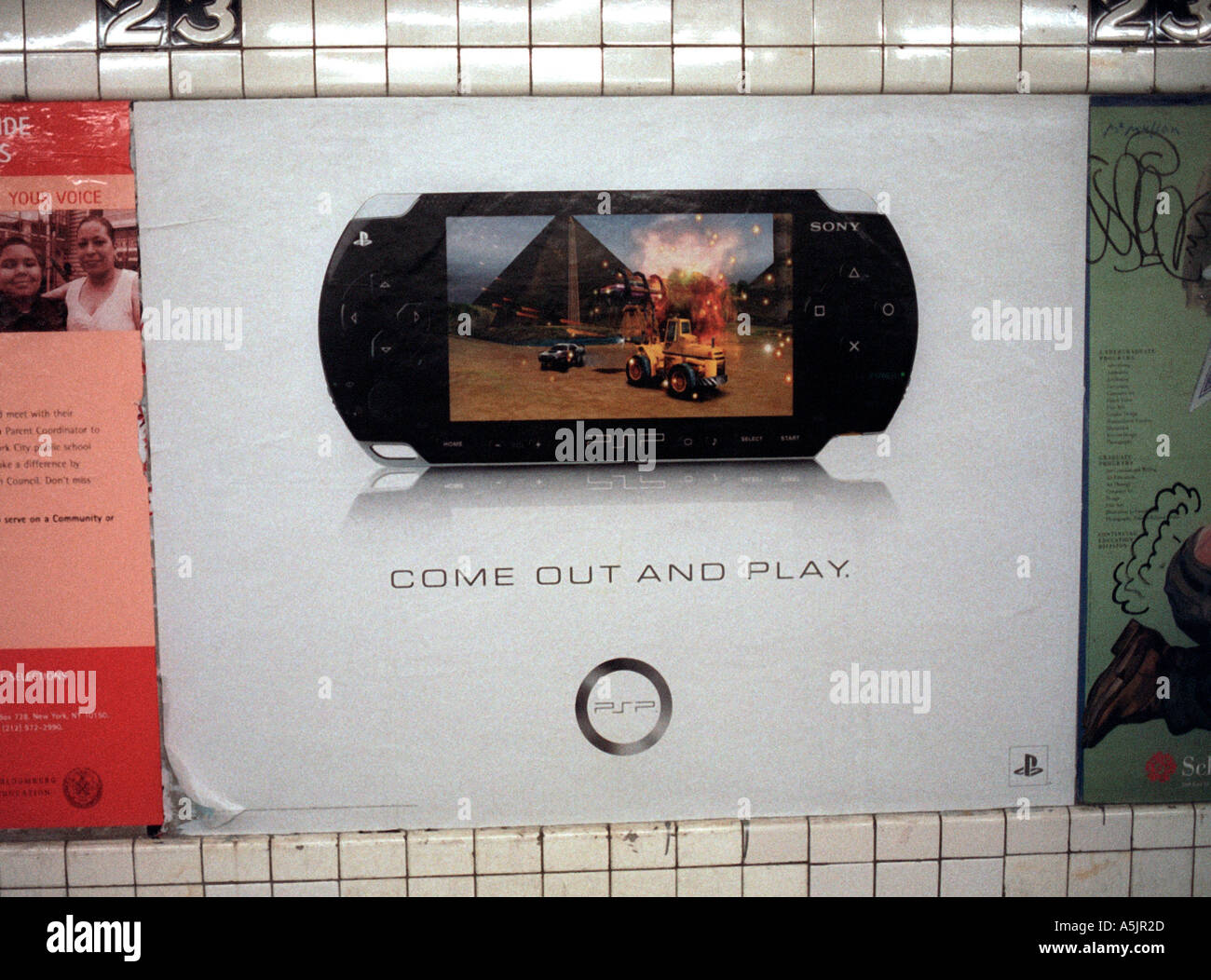 An advertisement for the popular Sony Play Station Portable in a NYC subway station  Stock Photo