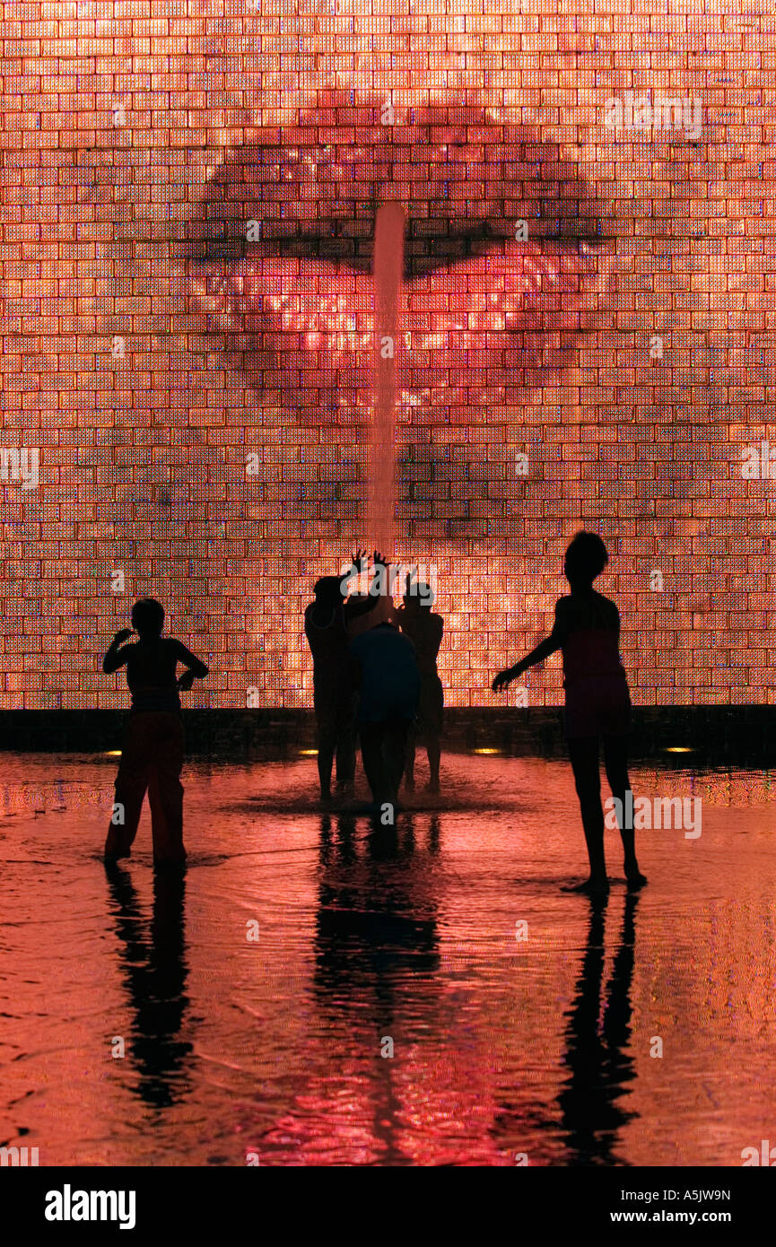 Kids playing in the water at Crown Fountain in Millennium Park Chicago Illinois Stock Photo