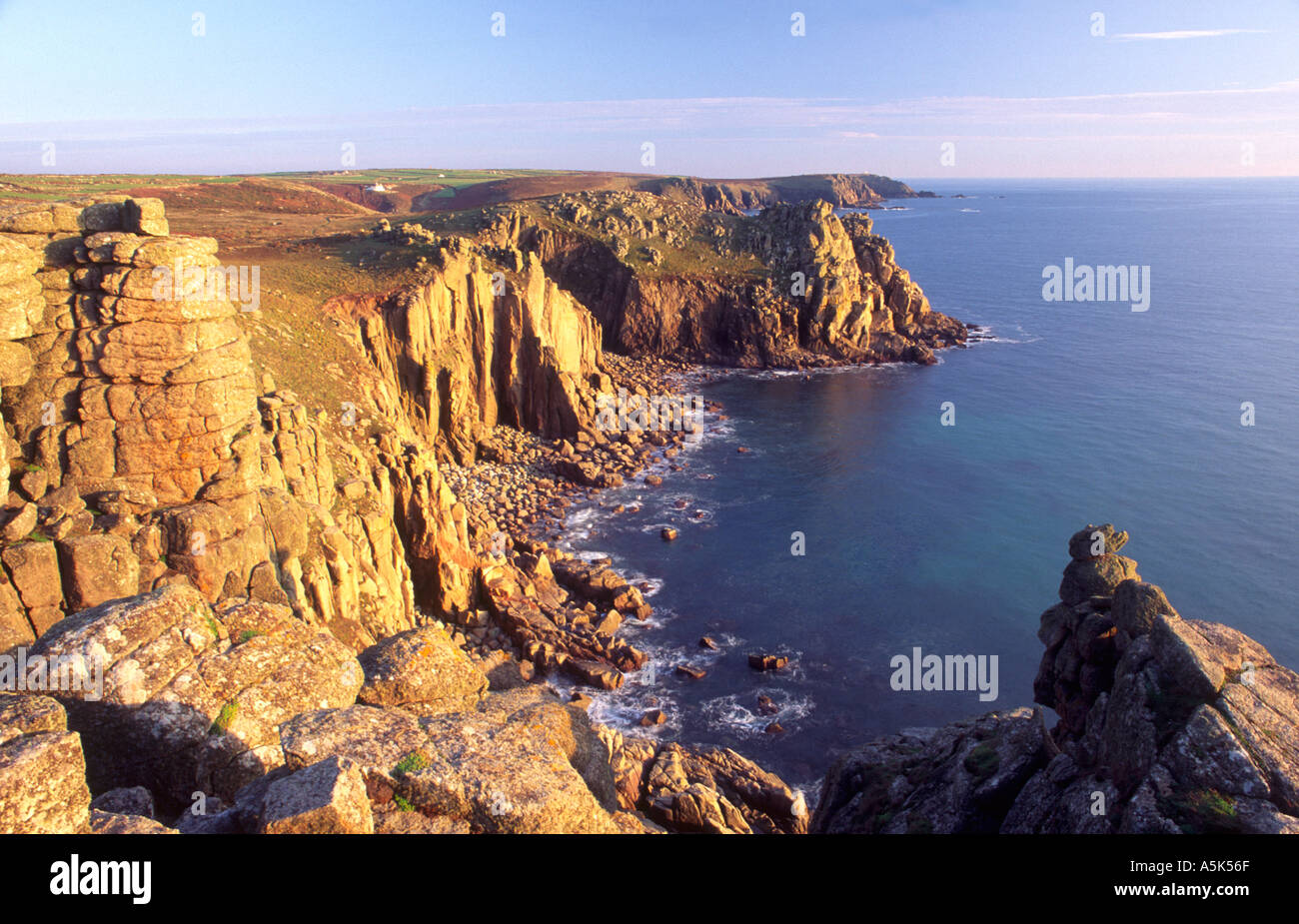 Granite cliffs near Lands End with a view southwest across the Atlantic Ocean Cornwall UK Stock Photo