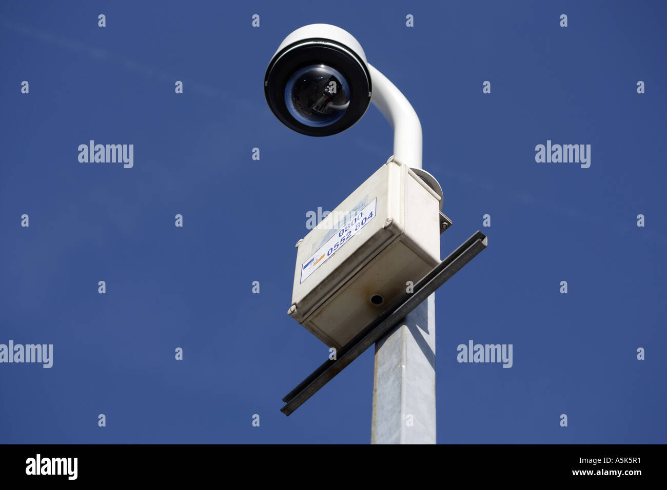 Security video camera guarding area Stock Photo