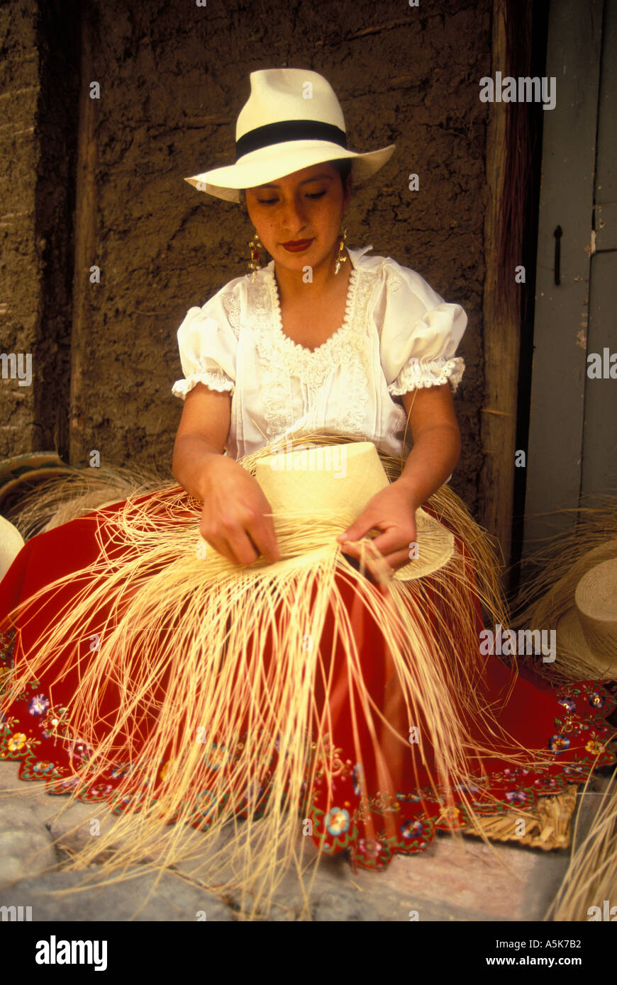 ECUADOR HIGHLANDS, CUENCA Home of the Panama Hat, Woman making Panama Hat by hand Stock Photo