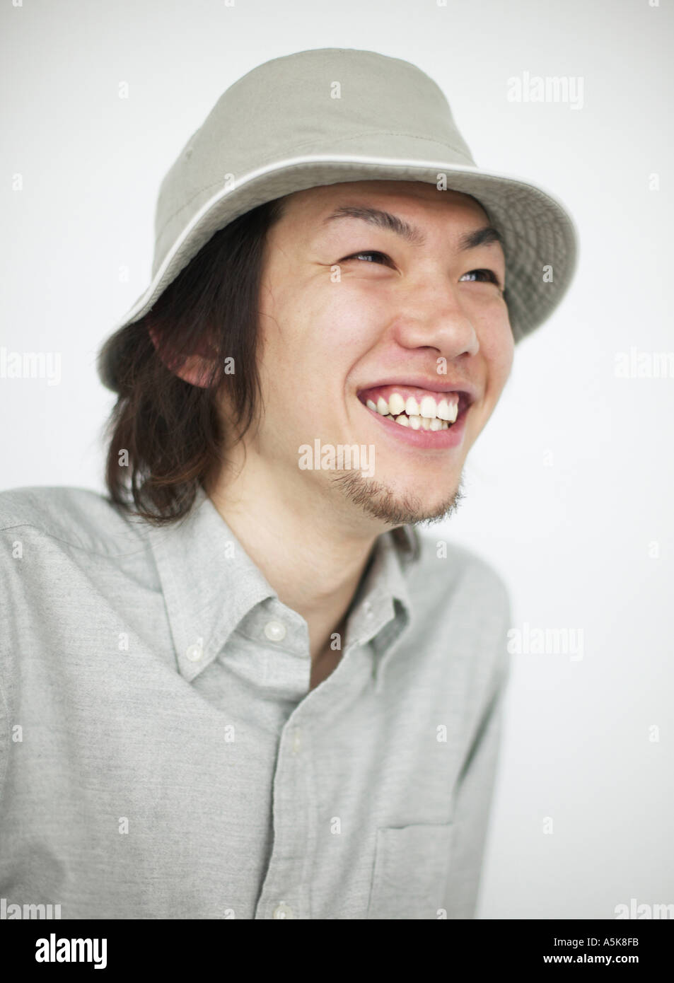 Young man laughing Stock Photo