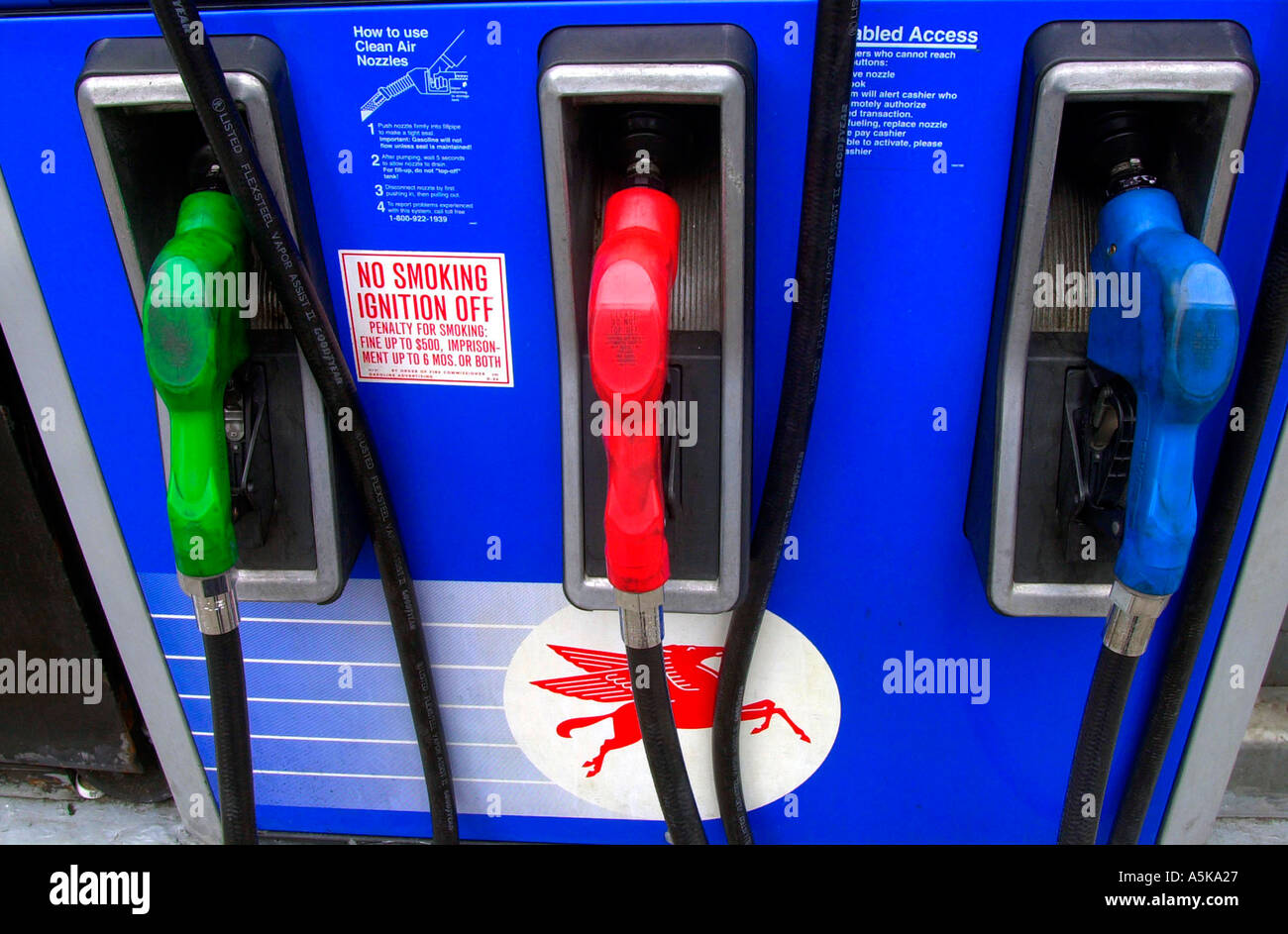 Gas pumps at a Mobil Gas Station  Stock Photo