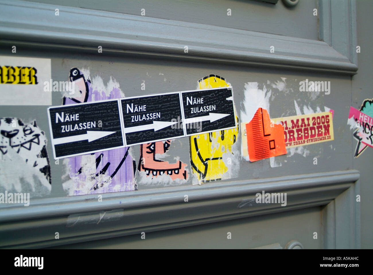 Eastgermany, GER, Germany: Stickers with slogans on a door. Stock Photo