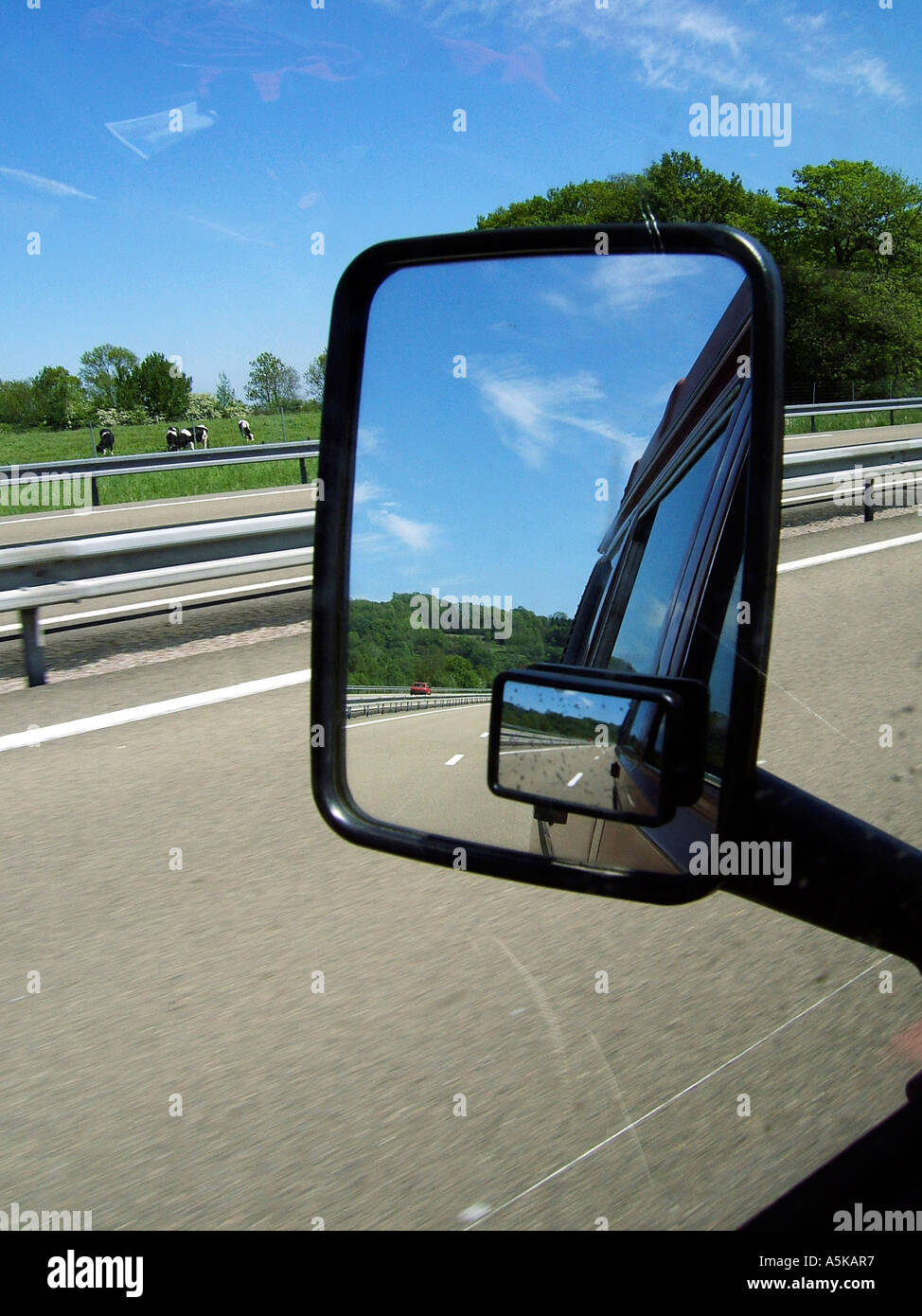 Look back in the rear view mirror Stock Photo - Alamy