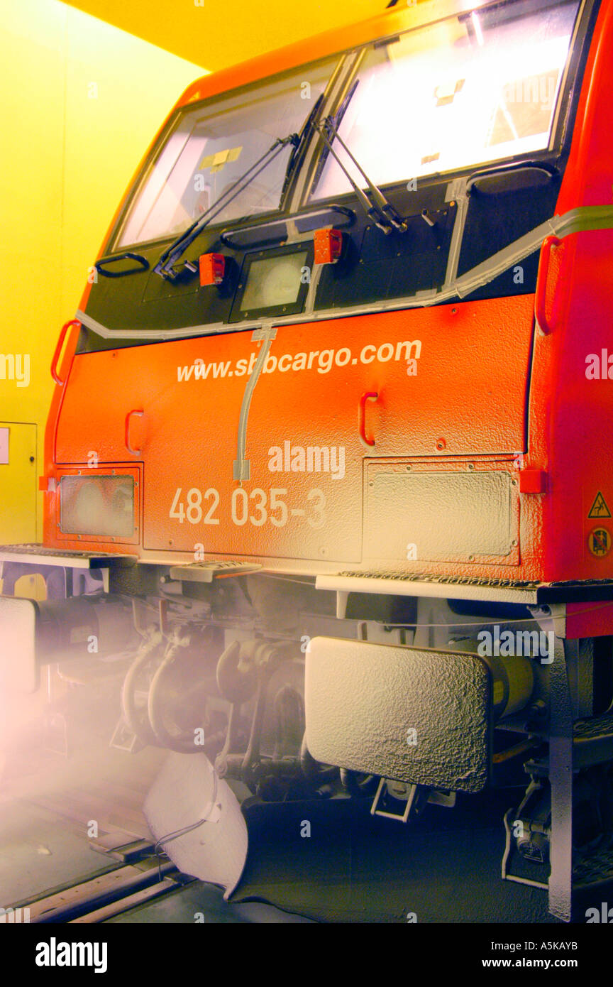 A train is getting snowed in for testing in the Artificial Climate Wind Channel, RTA Rail Tec Arsenal, Vienna, Austria Stock Photo