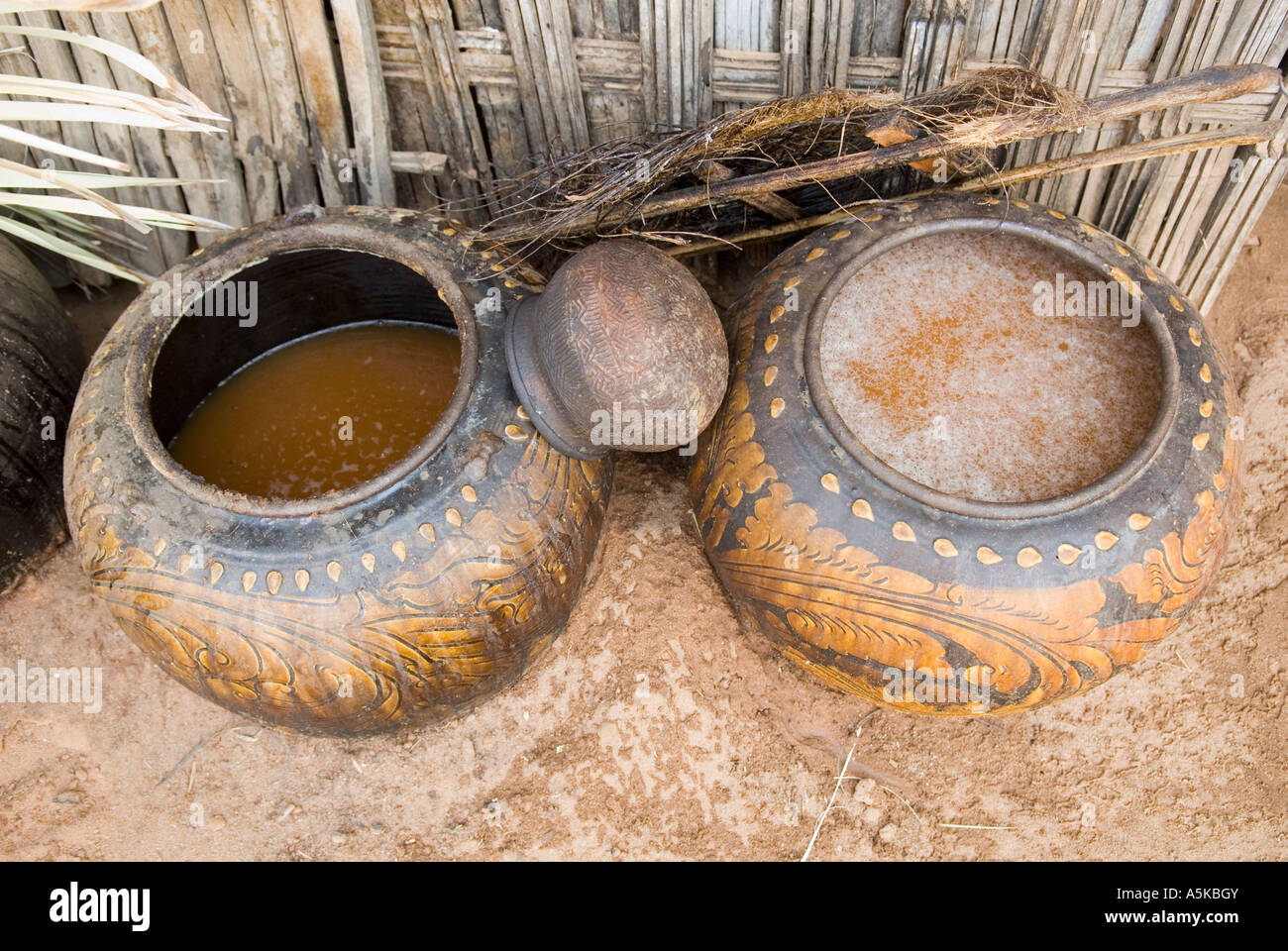 Fermentation of palm juice for the production of Toddy palmwine, Bagan, Myanmar Stock Photo