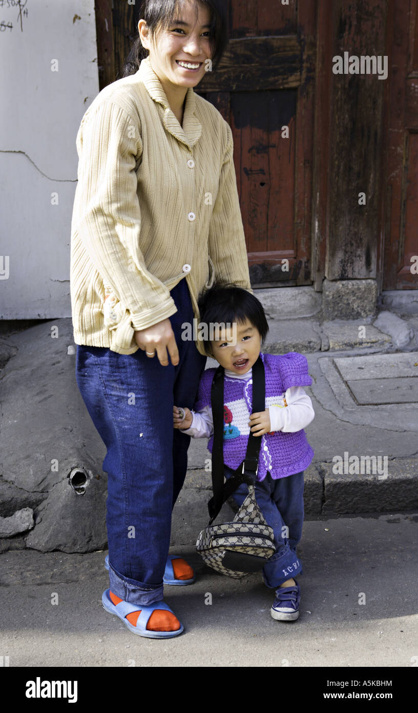 CHINA SHANGHAI Attractive young Chinese mother with her adorable ...