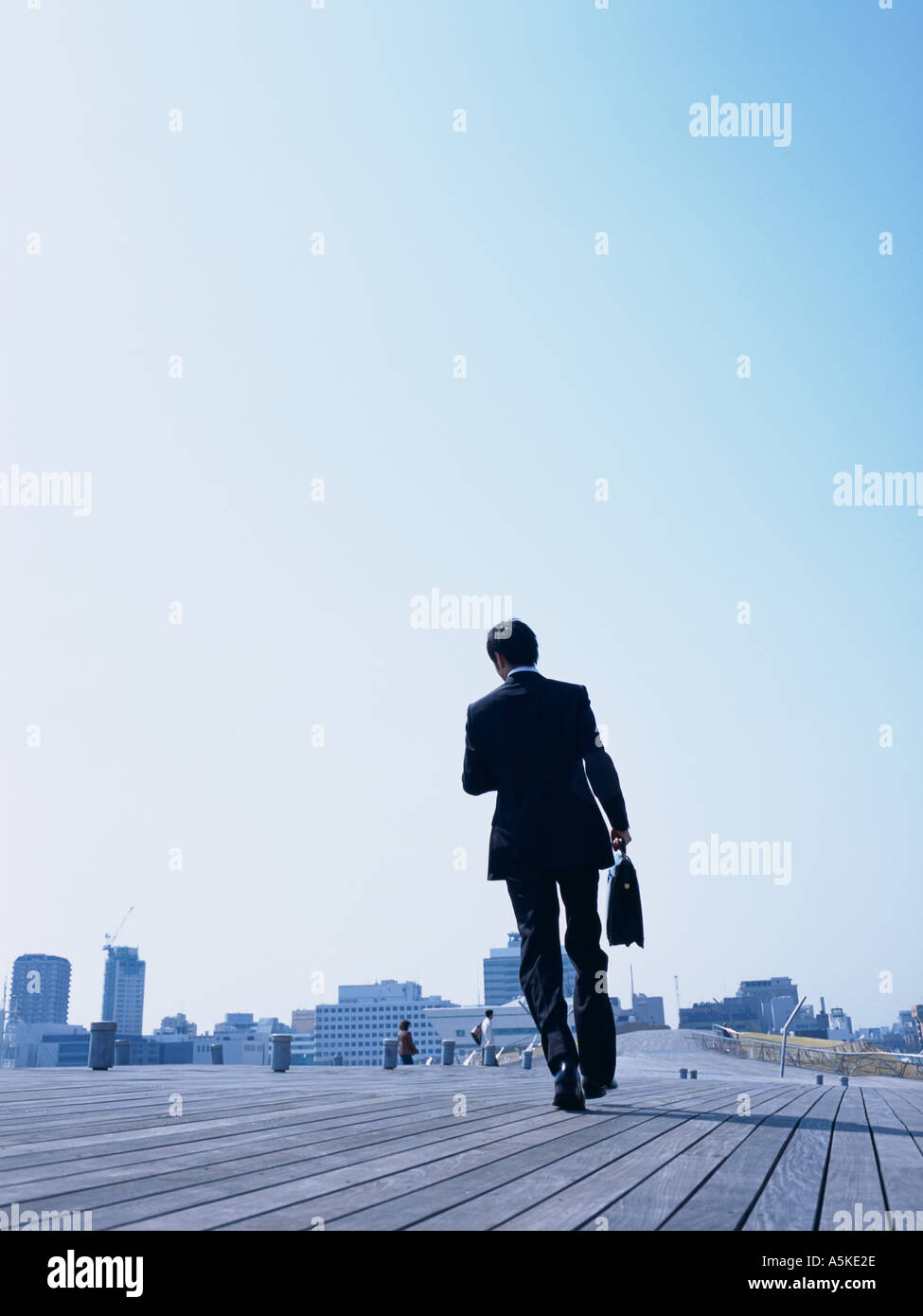 Back young black man walking hi-res stock photography and images - Alamy