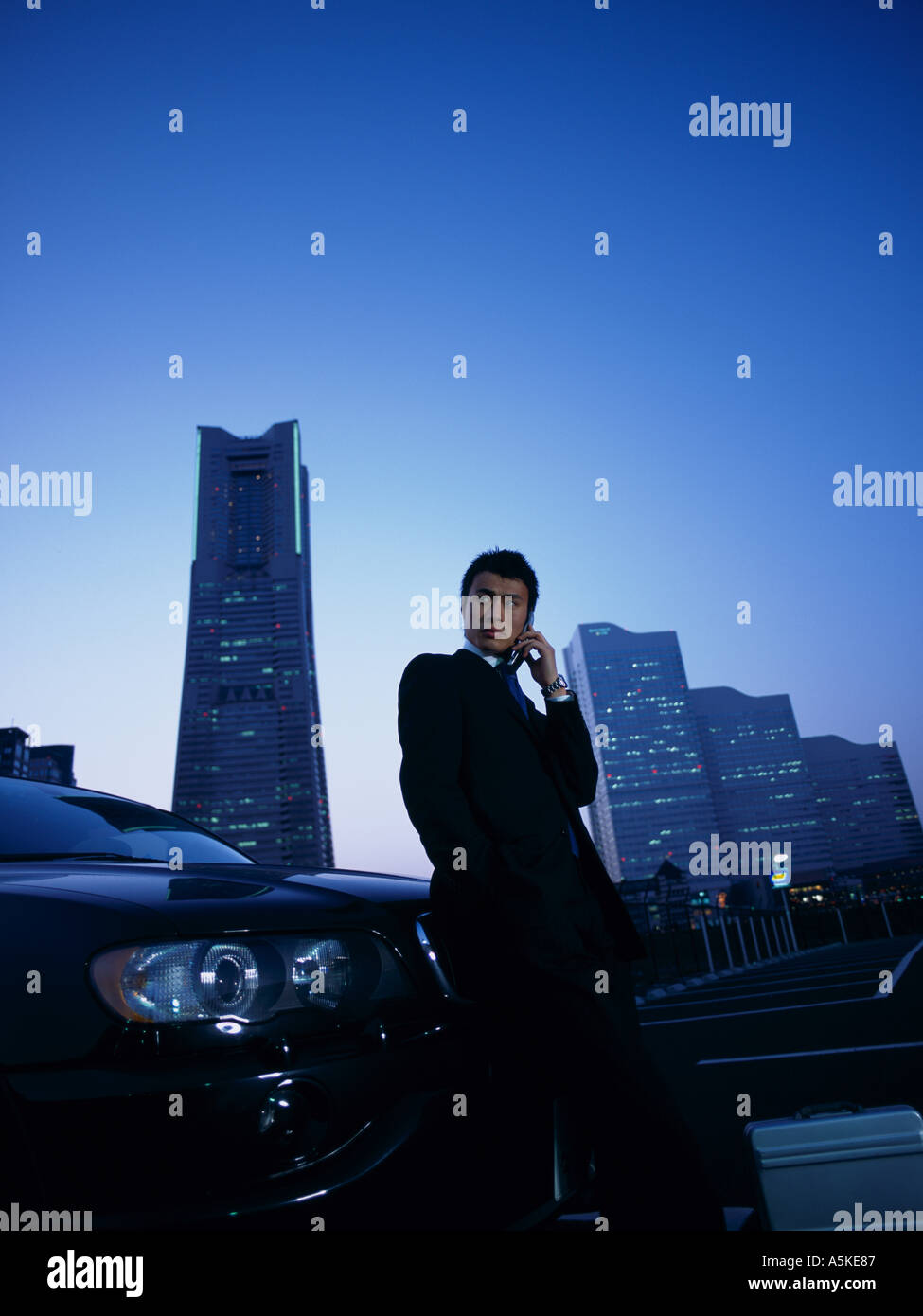 Asian Man on the cell phone Stock Photo