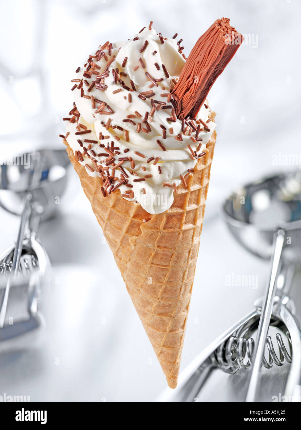 VANILLA ICE CREAM CONE WITH CHOCOLATE Stock Photo Alamy