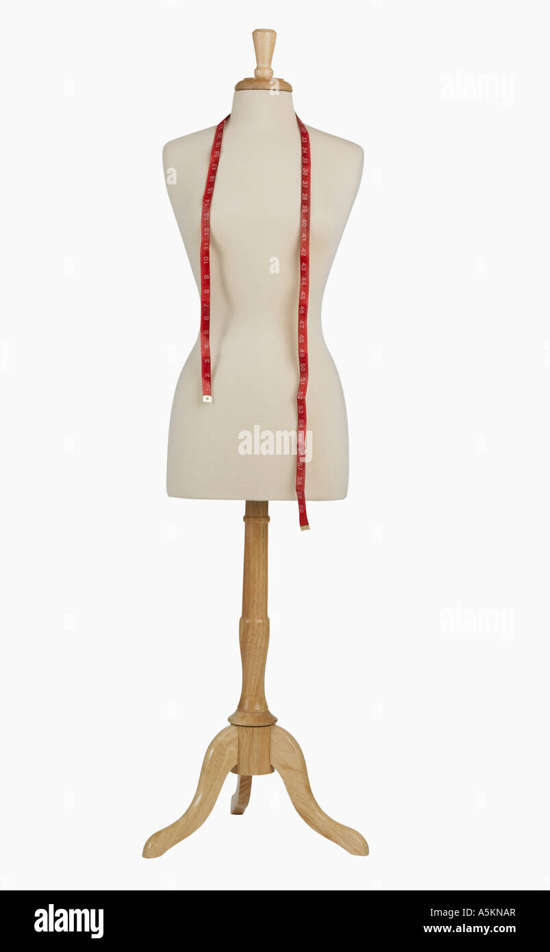 Studio shot of dress dummy and tape measure Stock Photo Alamy