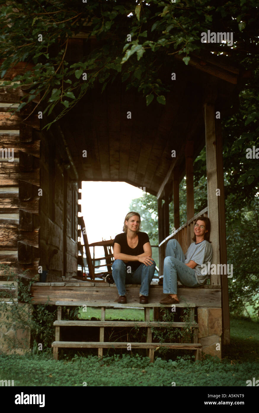 Two women sit on porch hi-res stock photography and images - Alamy