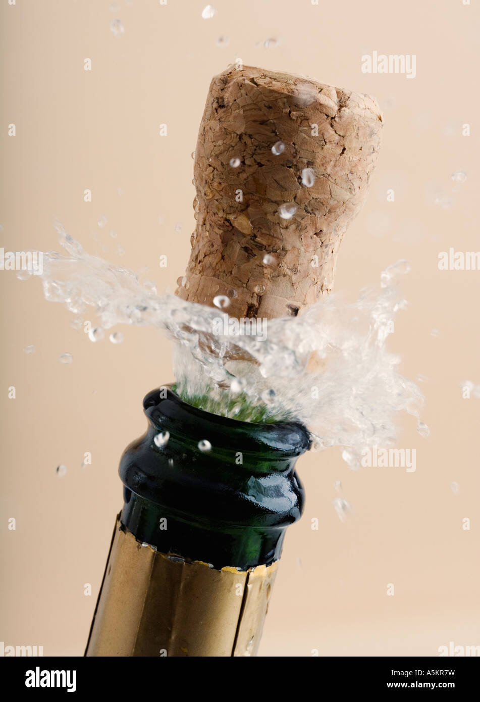 Close up of champagne cork popping Stock Photo Alamy