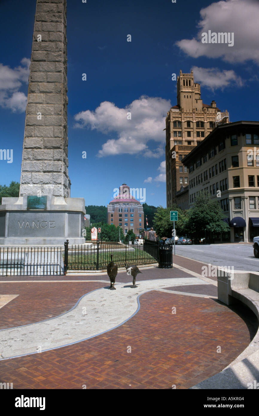 Vance Monument, the Jackson Building, and City Hall provide Asheville