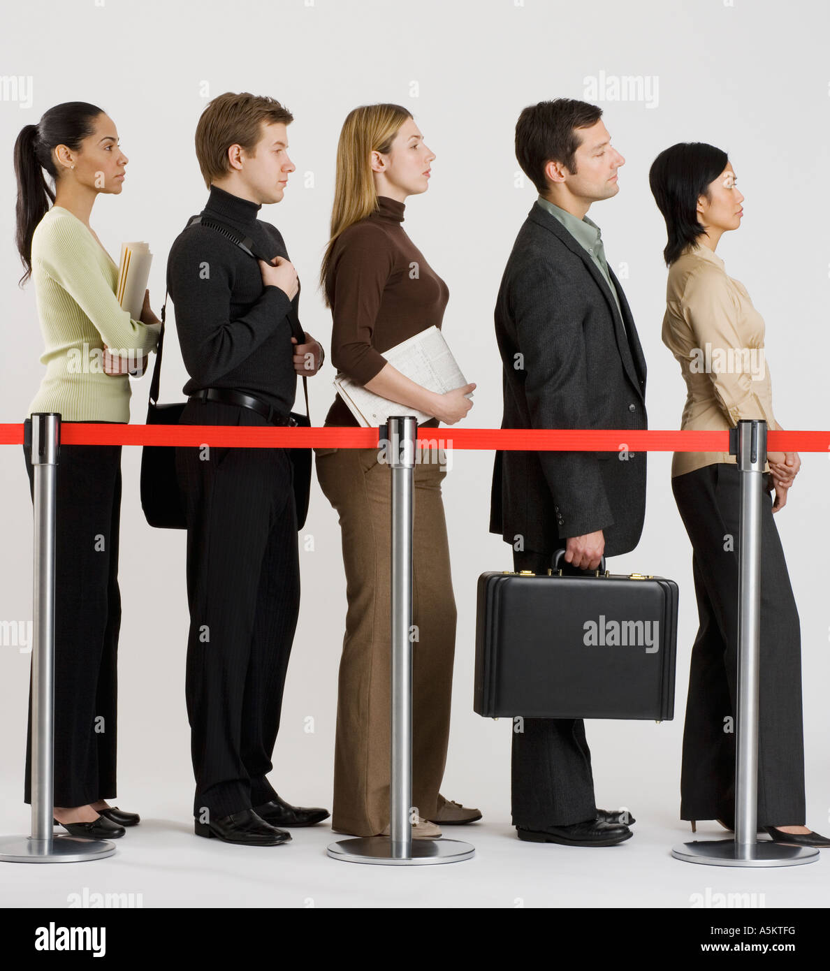 group of people standing in line Stock Photo - Alamy
