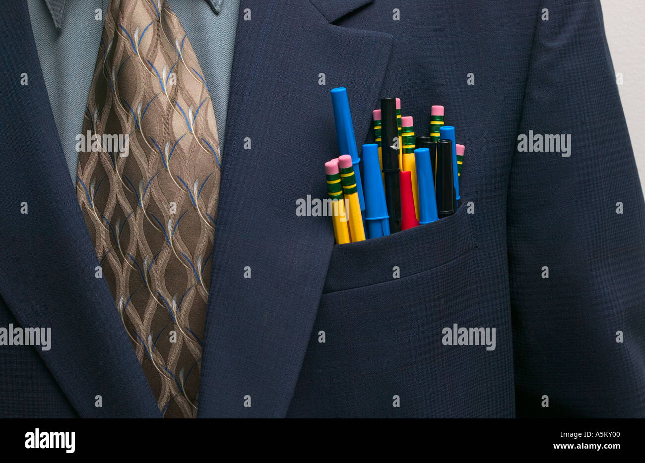 pens and pencils in suit pocket of executive Stock Photo