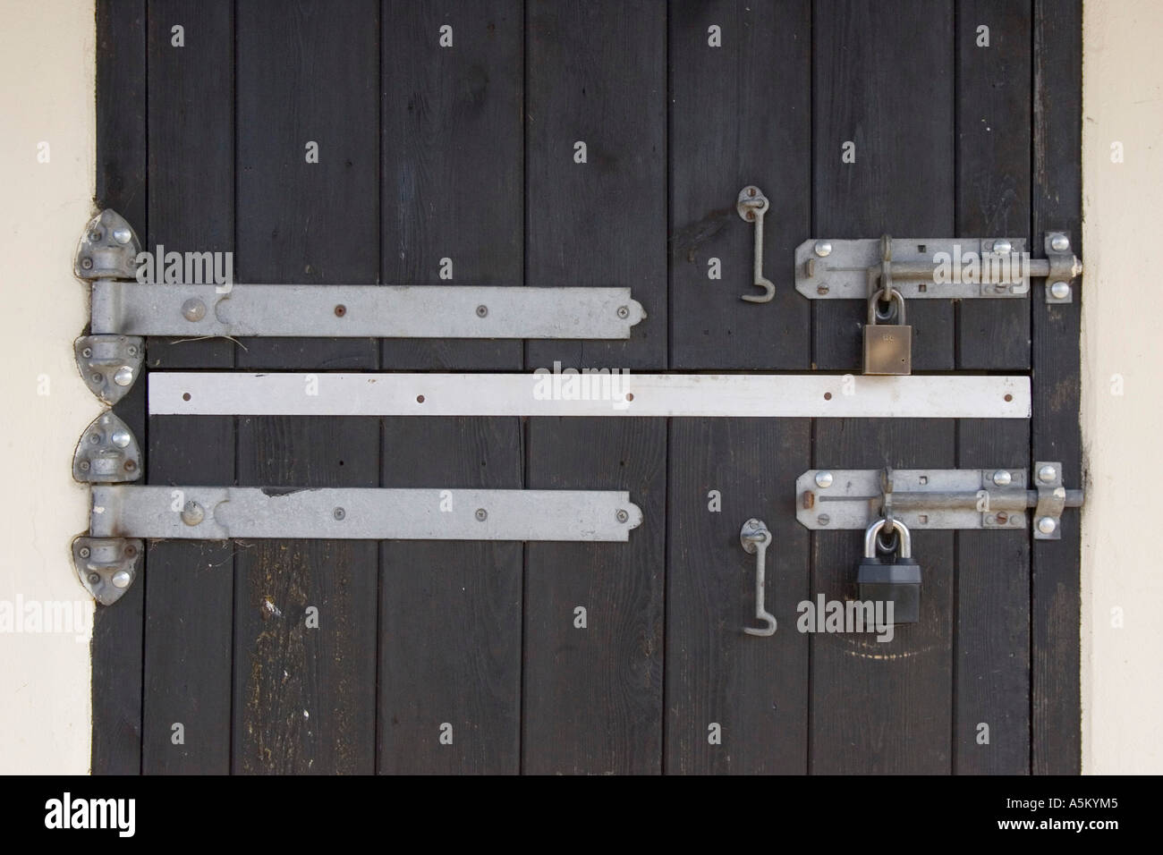 Padlock And Stable Tack Room Door Hinges Stock Photo