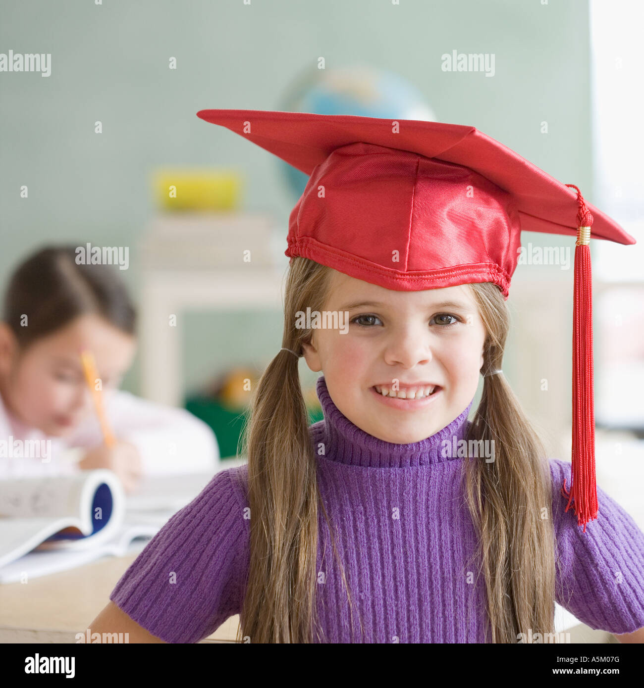 Portrait of girl wearing graduation cap Stock Photo Alamy