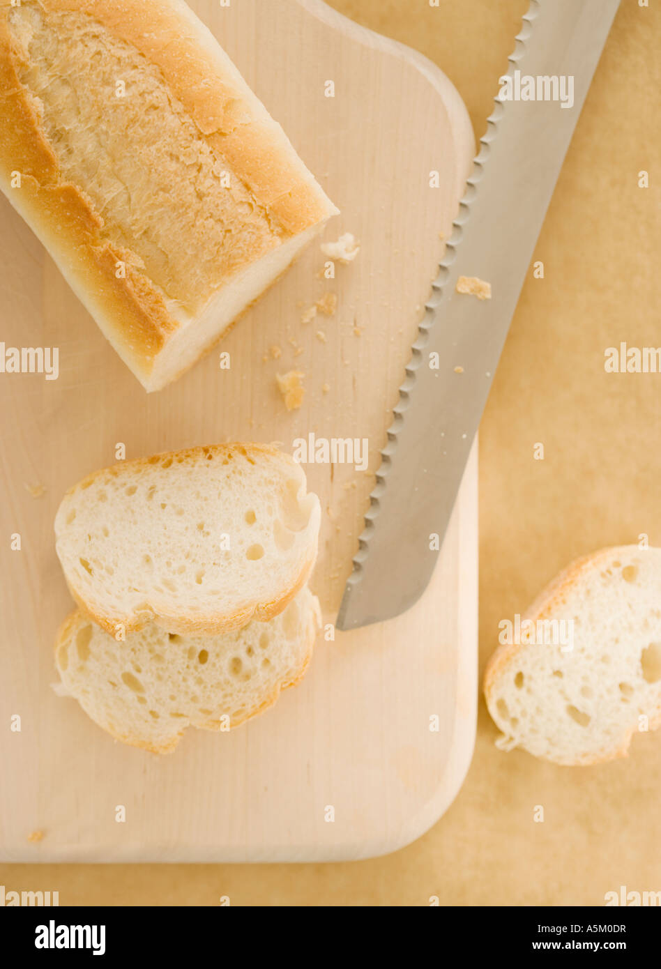 Sliced bread on cutting board Stock Photo