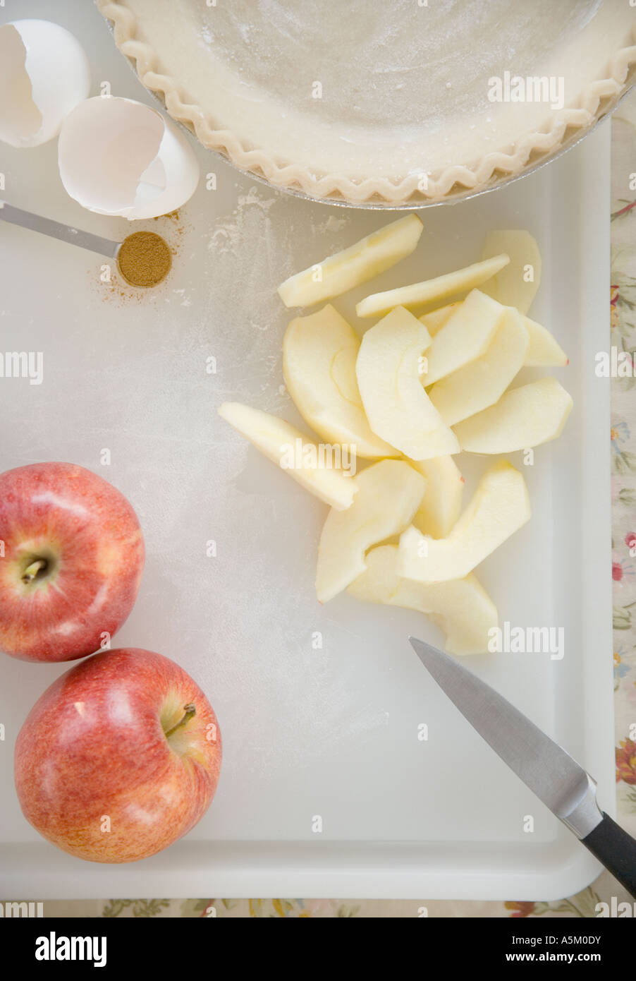 High angle view of slice apples and pie crust Stock Photo