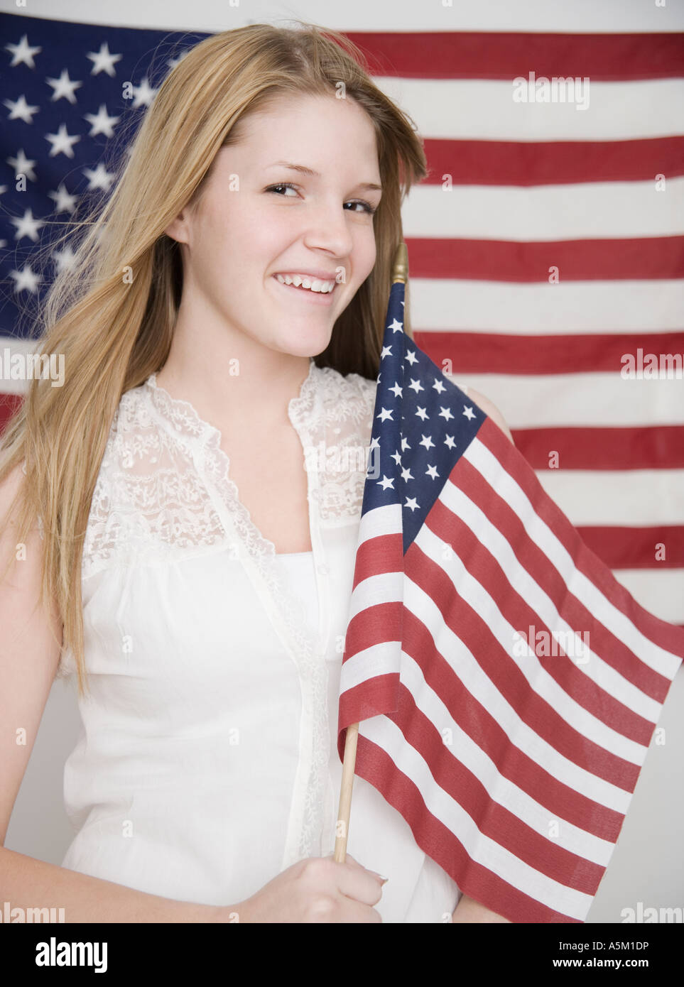 Smiling teenage girl american flag hires stock photography and images