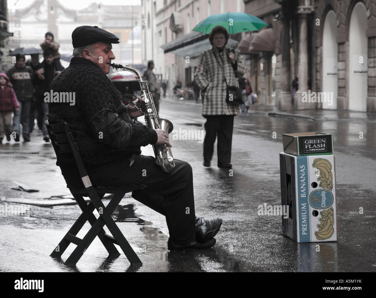 Busker on a side street in Rome Italy Stock Photo - Alamy