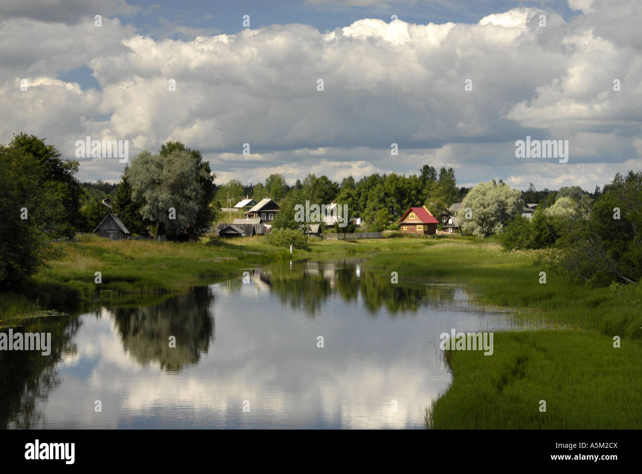 Summer views to Somino village and river Sominka, Leningrad region, Russia Stock Photo
