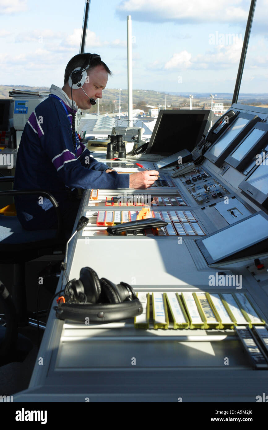 Air Traffic Controller at work in an airport control tower Stock Photo