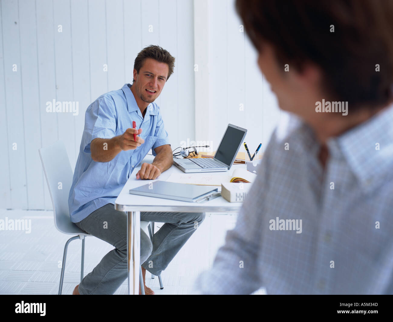 Two men talking home hi-res stock photography and images - Alamy