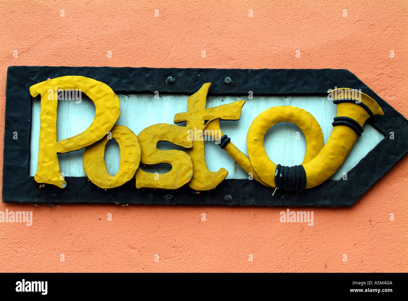 post office sign yellow pink wall hameln hamelin hamlin hamlyn germany