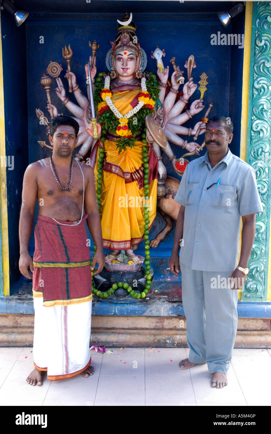 Devotees of the Hindu goddess of weather at the Sri Mariamman Indian temple in Johor Bahru Malaysia Stock Photo