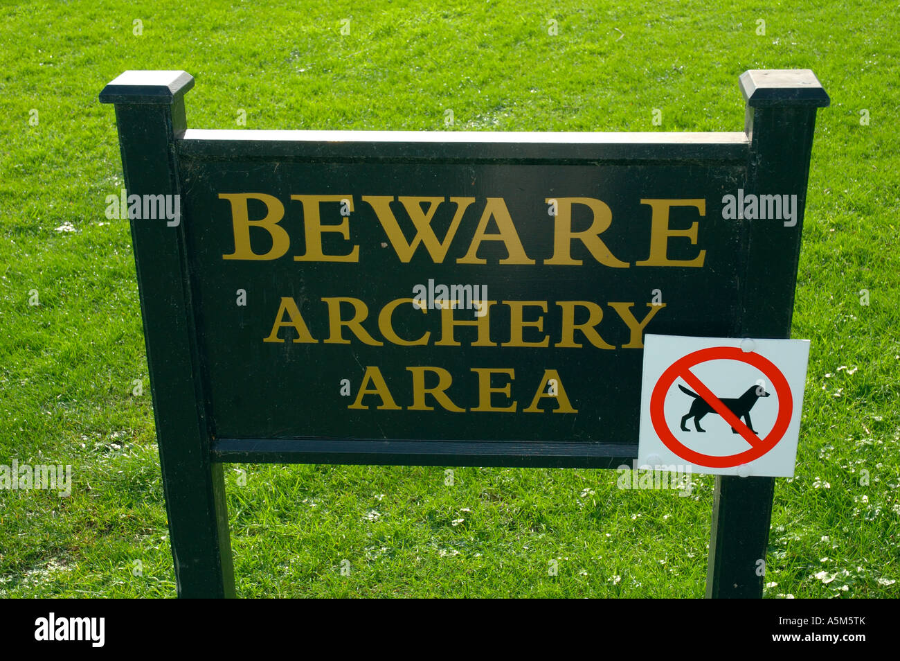 Dogs and Archery Sign, Bembrige, Isle of Wight, England, UK, GB Stock